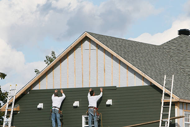 Professional Vinyl Siding technician working in Coulters, PA